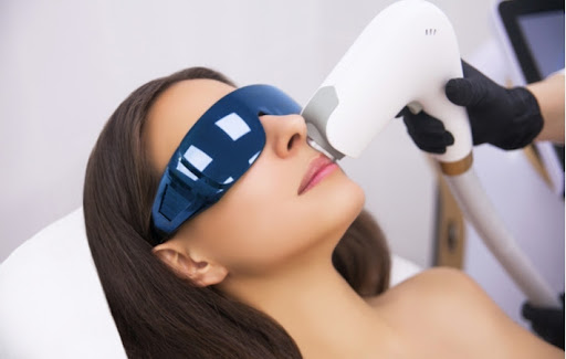 A woman getting intense pulsed light therapy for her dry eye